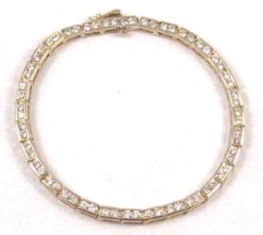 Appraisal: DIAMOND AND FOURTEEN KARAT GOLD BRACELET - '' in length