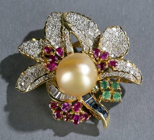 Appraisal: Ruby sapphire emerald diamond and pearl brooch A ruby sapphire