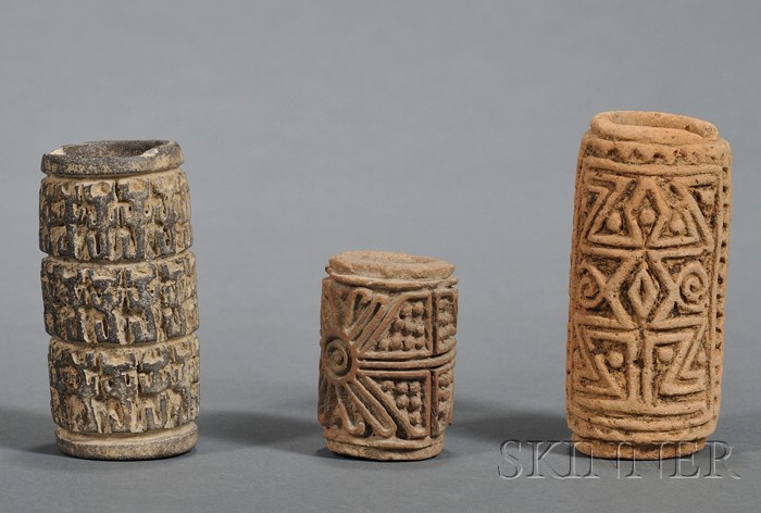 Appraisal: Three Pre-Columbian Pottery Stamps Colombia the cylindrical forms decorated with