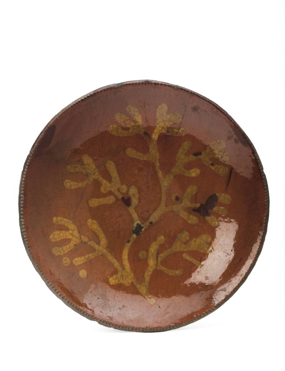 Appraisal: PENNSYLVANIA SLIP-DECORATED GLAZED REDWARE DISH EARLY NINETEENTH CENTURY Decorated with