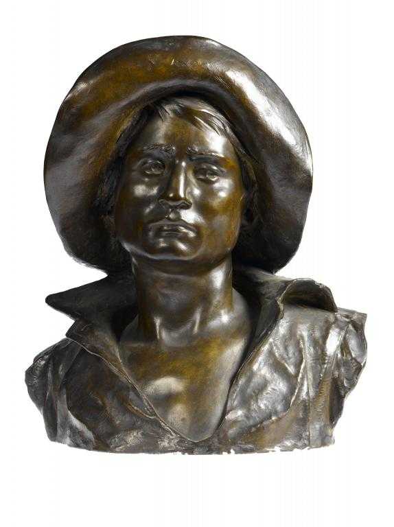 Appraisal: A LIFE SIZED BRONZE PAINTED PLASTER BUST OF A COWBOY