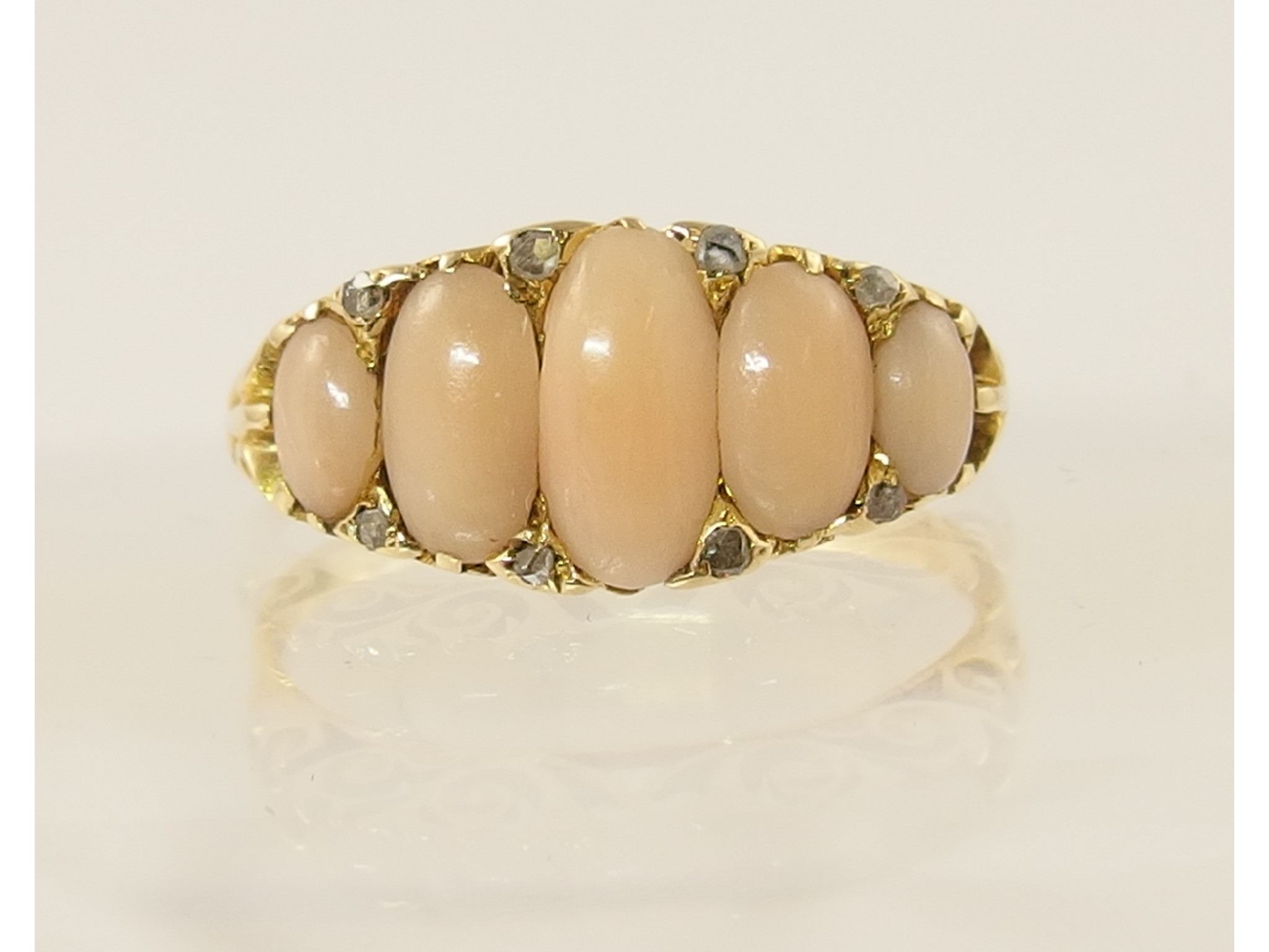 Appraisal: An Edwardian coral and diamond ring