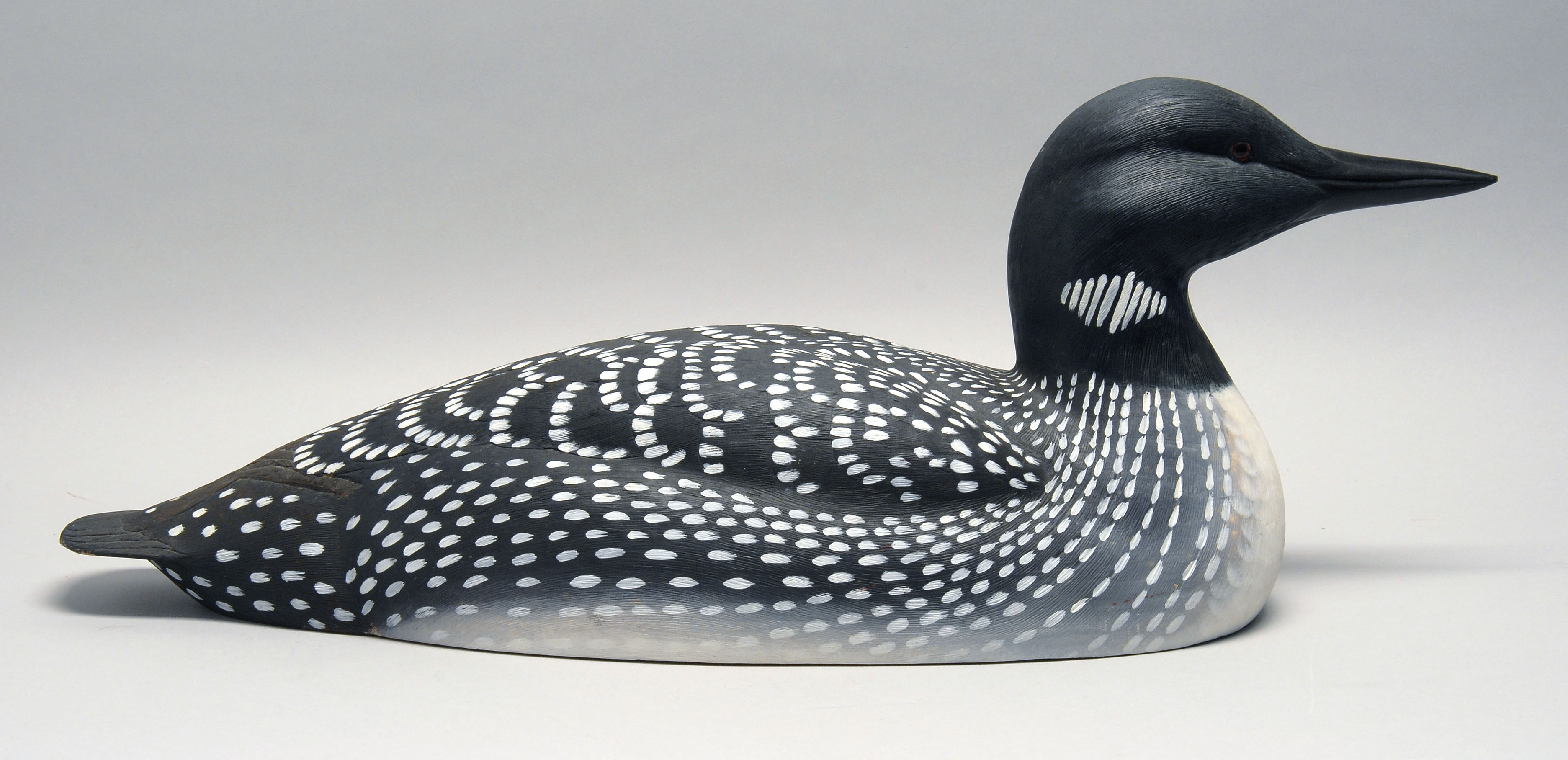 Appraisal: LIFE-SIZE DECORATIVE CARVING OF A LOON By Bill Veasey of