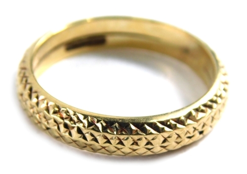 Appraisal: A ct gold wedding band of hammered design ring size