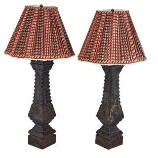 Appraisal: PAIR OF CAST IRON BALUSTER LAMPS Featuring a rosette detail