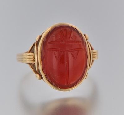 Appraisal: A Carved Scarab Ring k yellow gold ring with decorative