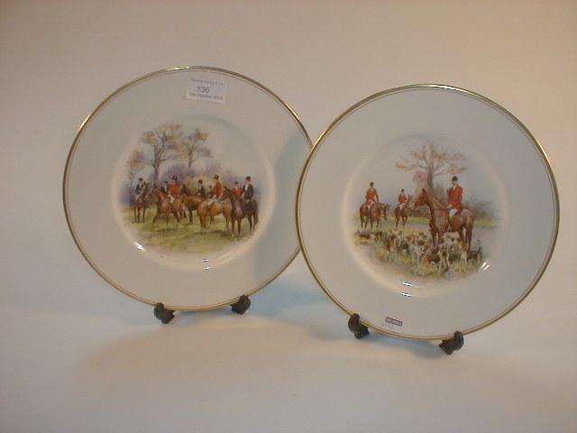 Appraisal: A pair of Royal Worcester hunting plates signed T Ivester