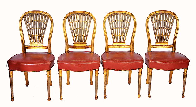 Appraisal: A SET OF FOUR CONTINENTAL POSSIBLY ITALIAN GILDED DINING CHAIRS