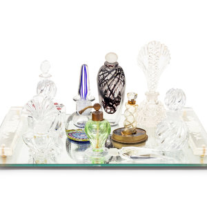 Appraisal: A Collection of Eleven Glass Perfume Bottles and a Mirrored