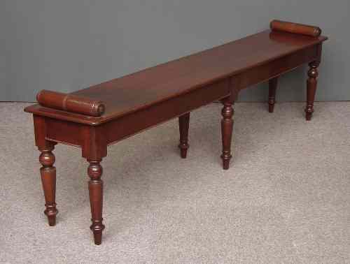 Appraisal: An early Victorian mahogany window seat on six turned legs