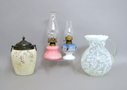 Appraisal: Glassware to include a pitcher lamps and a cow canister