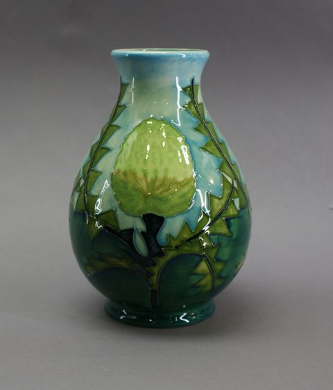 Appraisal: A shouldered ovoid vase with everted rim in the Banksia