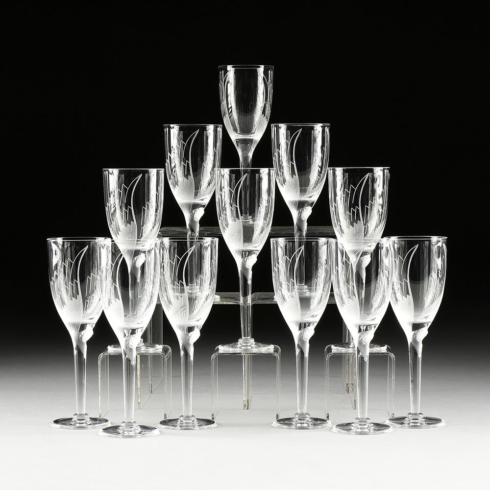 Appraisal: A SET OF TWELVE LALIQUE ETCHED CHAMPAGNE STEMWARE Ange FRANCE