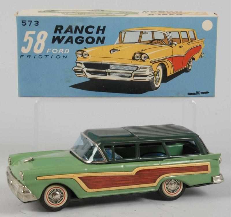 Appraisal: Tin Litho Ford Ranch Wagon Friction Toy Description Japanese Working