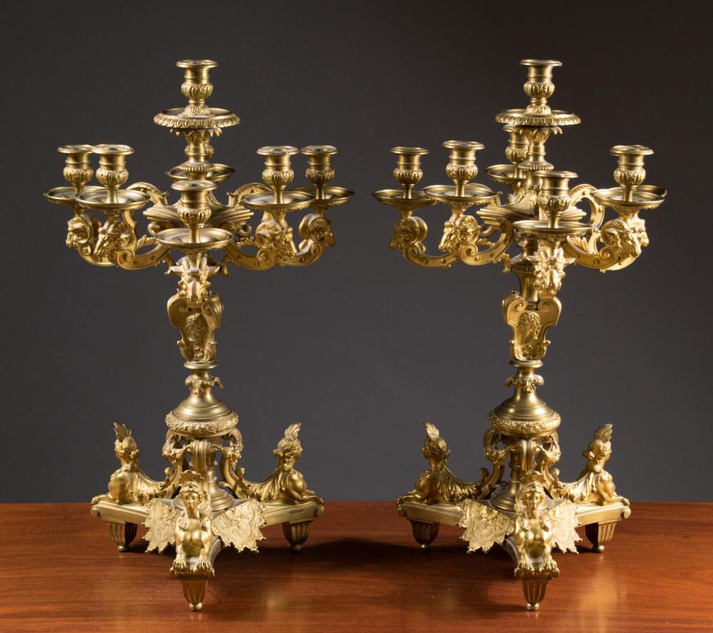 Appraisal: PAIR OF SEVEN-LIGHT GILT BRONZE CANDELABRA French th century three