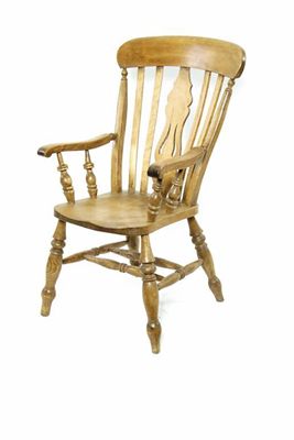 Appraisal: A Victorian fruitwood and ash Windsor armchair the pierced splat