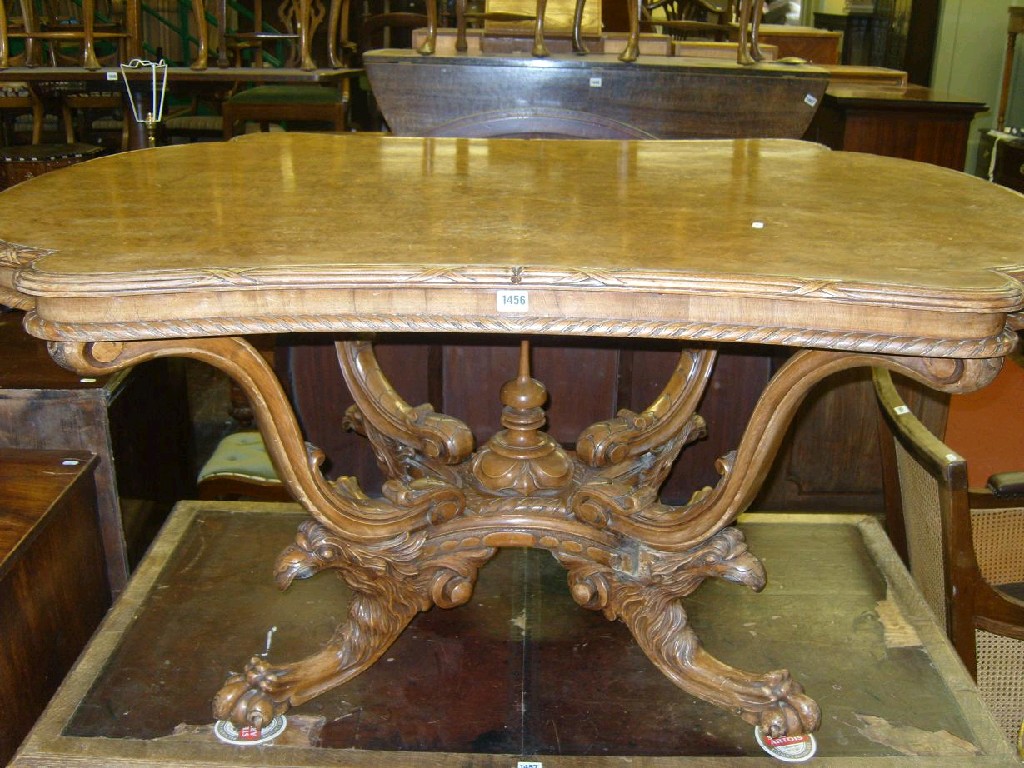 Appraisal: A Victorian walnut centre table of rectangular form with well