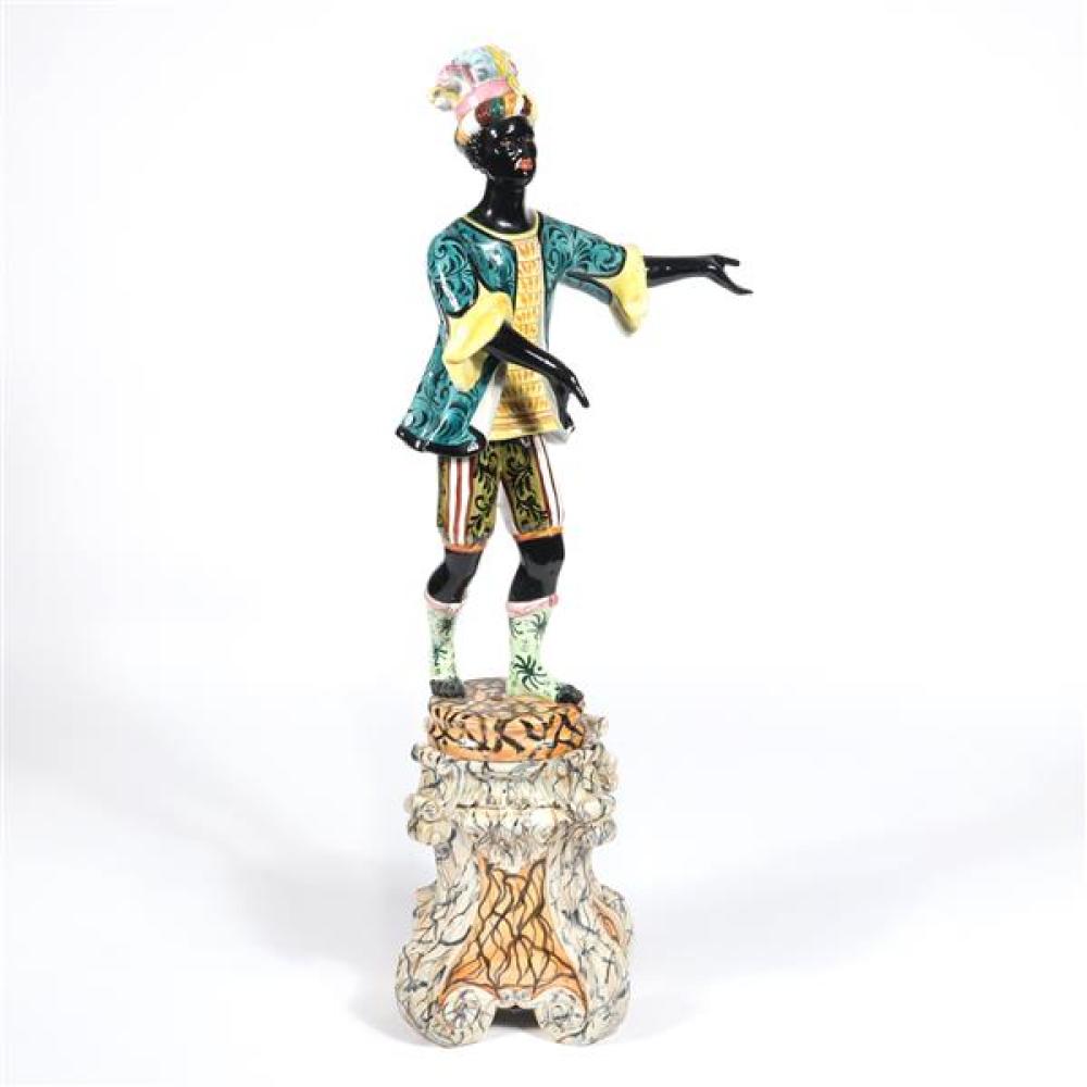 Appraisal: ITALIAN CAPODIMONTE TALL ITALIAN HAND PAINTED BLACKAMOOR FIGURE WITH MULTICOLORED