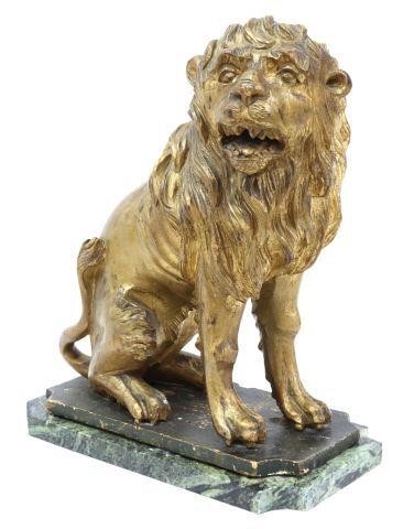 Appraisal: Antique carved giltwood lion sejant juvenile lion with open mouth