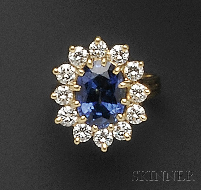 Appraisal: kt Gold Sapphire and Diamond Ring set with an oval-shaped