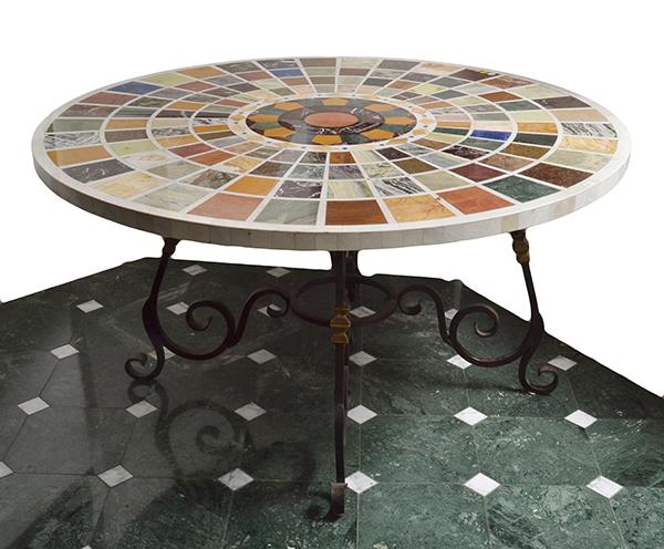 Appraisal: A CIRCULAR SPECIMEN MARBLE INLAID CENTRE TABLE with a radiating