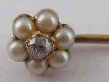 Appraisal: A diamond and pearl set gold stick pin stamped ct