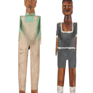 Appraisal: Two Folk Art Carved and Painted Wood Figures th Century