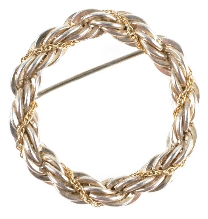 Appraisal: Tiffany Co sterling silver and k yellow gold braided rope