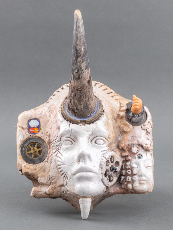 Appraisal: POSTMODERN FOUND OBJECT MIXED MEDIA MASK SCULPTURE Postmodern upcycled found