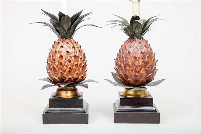 Appraisal: Pair of T le-Mounted Composition Pineapple-Form Lamps and in Property