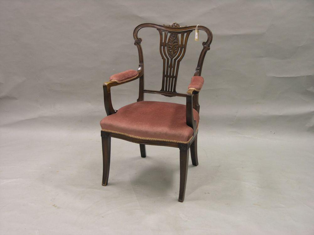 Appraisal: An Edwardian mahogany drawing room armchair with carved pierced back