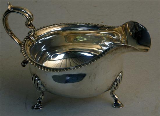 Appraisal: George V silver sauce boat Birmingham ozs h in