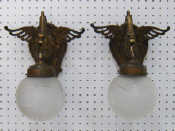 Appraisal: A pair of bronze wall lights the frosted and cut