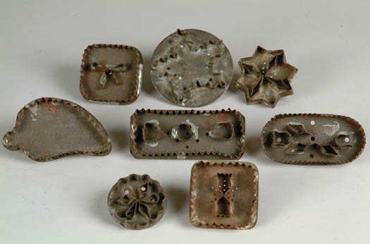 Appraisal: EIGHT HANDLED TIN COOKIE CUTTERS Mostly geometric forms with crimped