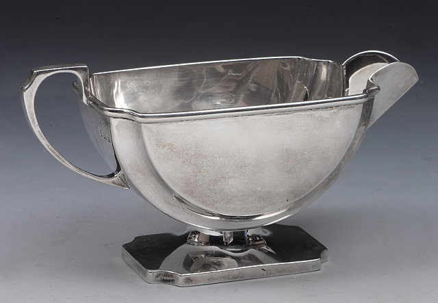 Appraisal: AN ART DECO SILVER SAUCE BOAT with a half moon