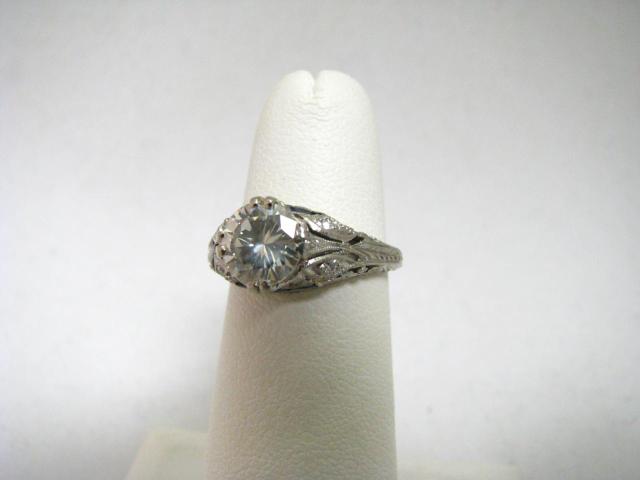 Appraisal: Platinum and diamond ring with ct round solitaire I SI-