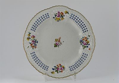 Appraisal: Three Meissen plates the reticulated rims painted with flowers around