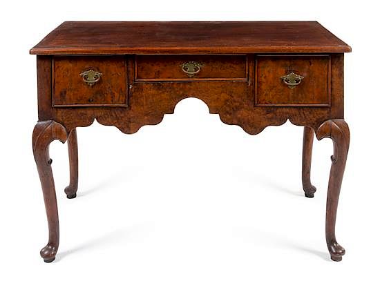 Appraisal: A Georgian Walnut Lowboy Height x width x depth inches