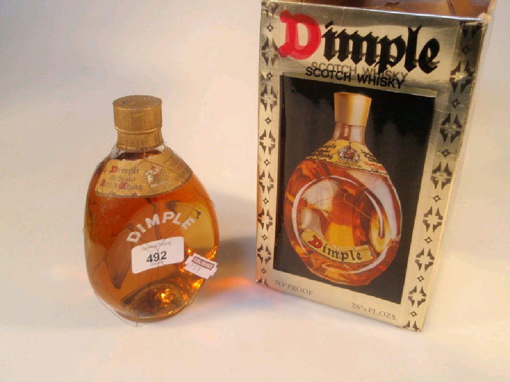 Appraisal: A Haig Dimple scotch whiskey bottle unopened in original box