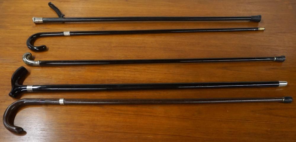 Appraisal: Two Sterling Mounted and Three Sterling Banded Wood Canes