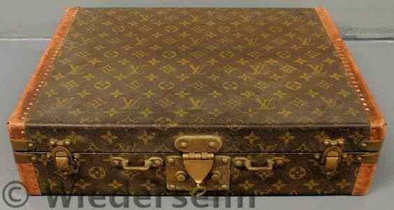 Appraisal: Louis Vuitton suitcase c with original key h x w