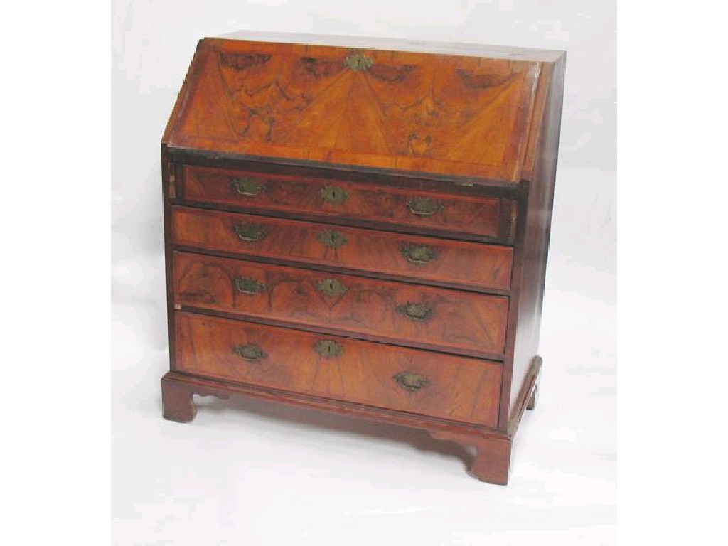 Appraisal: A GEORGE II WALNUT BUREAU inlaid with herringbone banding with