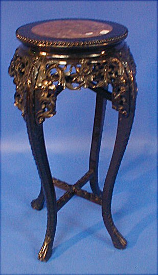 Appraisal: A Chinese carved rose wood jardiniere stand with marble inset