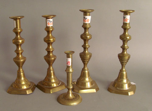 Appraisal: Two pair of brass candlesticks h h