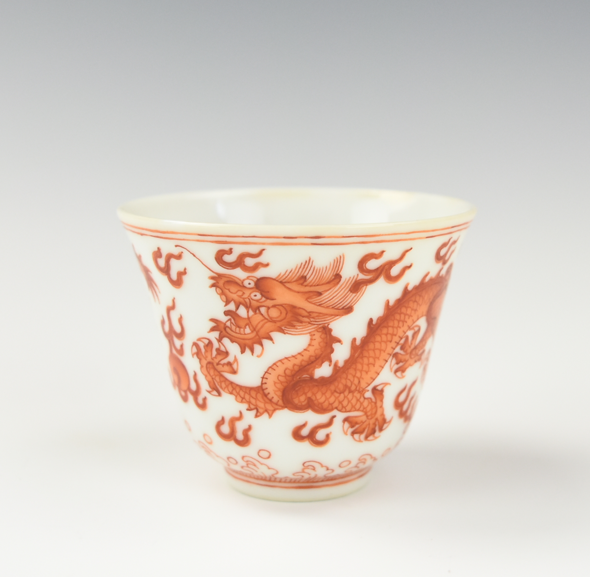 Appraisal: CHINESE IRON-RED DRAGON CUP W XIANFENG MARK A Chinese porcelain