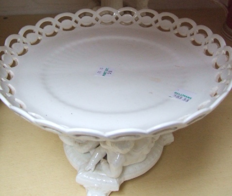 Appraisal: Two Victorian white glaze pedestal comports with pierced frieze and