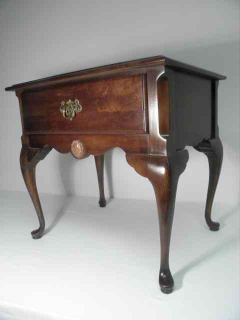 Appraisal: Small Mahogany end table with one drawer brass pulls and