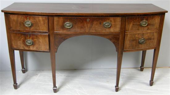 Appraisal: th century bow fronted mahogany sideboard with five drawers on