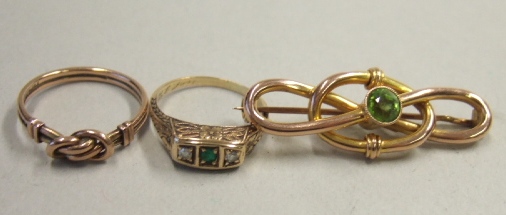 Appraisal: A gold emerald and diamond set three stone ring with