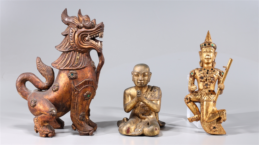 Appraisal: Group of Thai gilt wood carvings including figures and one